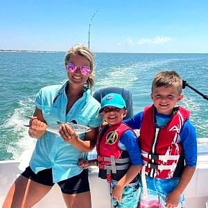 Family fishing trip — three Spanish mackerel